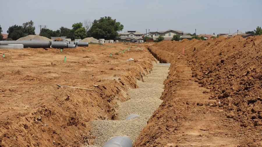 Trenches and pipe runs on a suburban work site